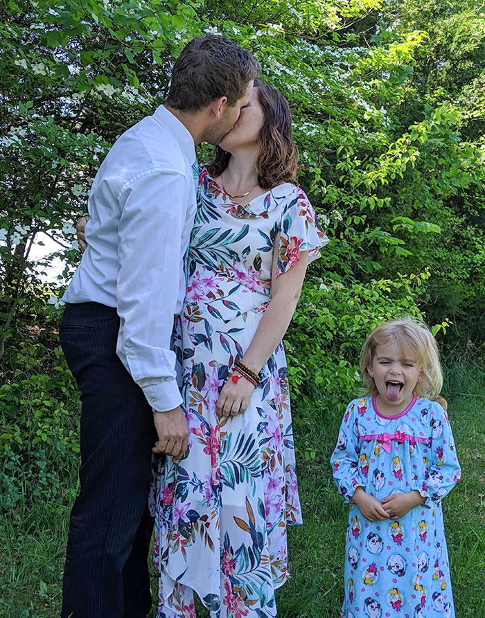 My Daughter Wanted To Be In The Photo With Us. We Didn't Tell Her We Were Going To Kiss