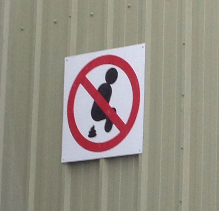 Apparently, People Do This Enough To Warrant A Sign. Between 2 Buildings At Work