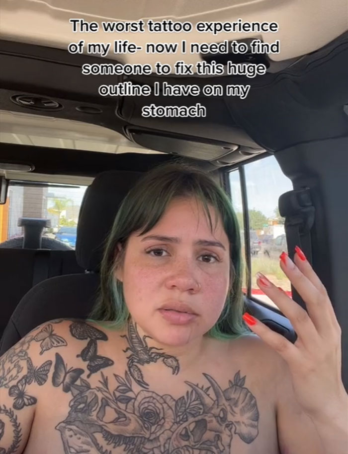 Woman with tattoos, looking upset, shares her tattoo session experience. Text overlay: "The worst tattoo experience of my life.