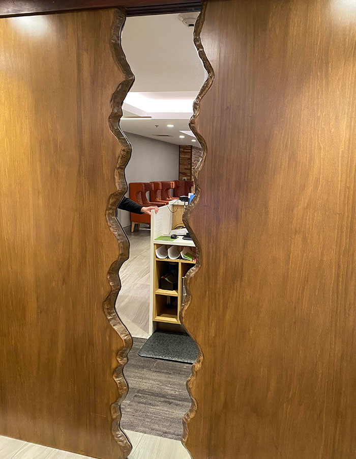 This Mirror In The Front Of My Hotel Looks Like You Can Walk Through It