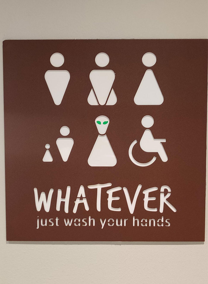 Signage Outside The Toilets At The Hotel I'm Staying At