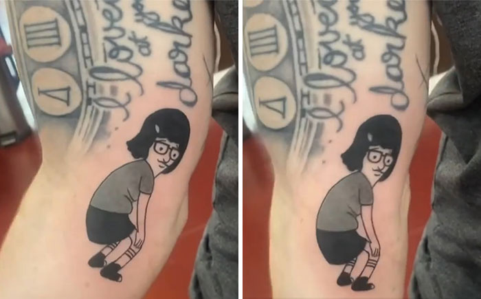 Cartoon character tattoo on arm, revealing its full design when the arm moves.