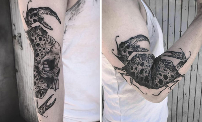 Tattoo of an animal on arm that changes as the elbow bends, showcasing its full art brilliance.