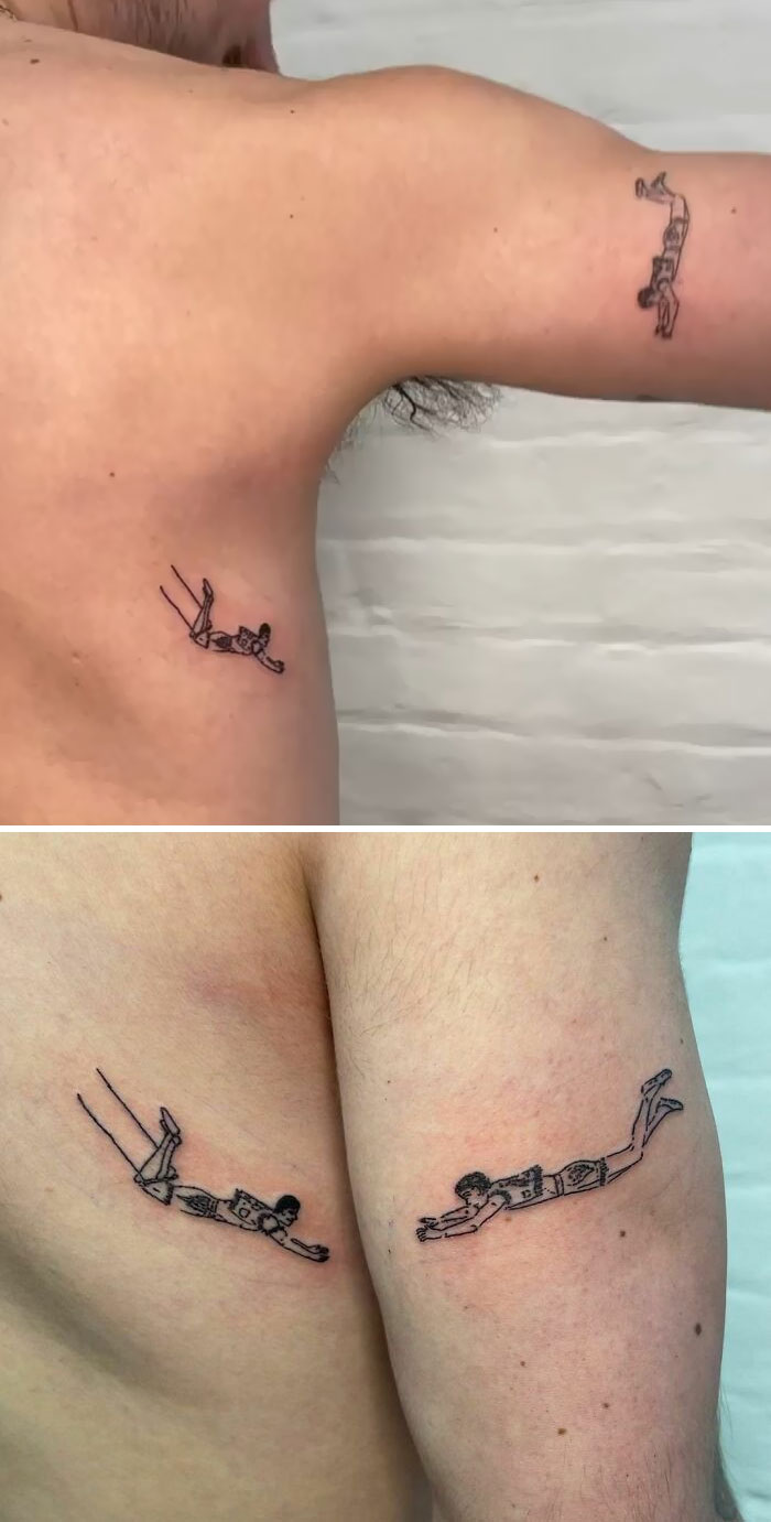 Two genius tattoos of divers on an arm, appearing as if they are leaping when the arm moves.