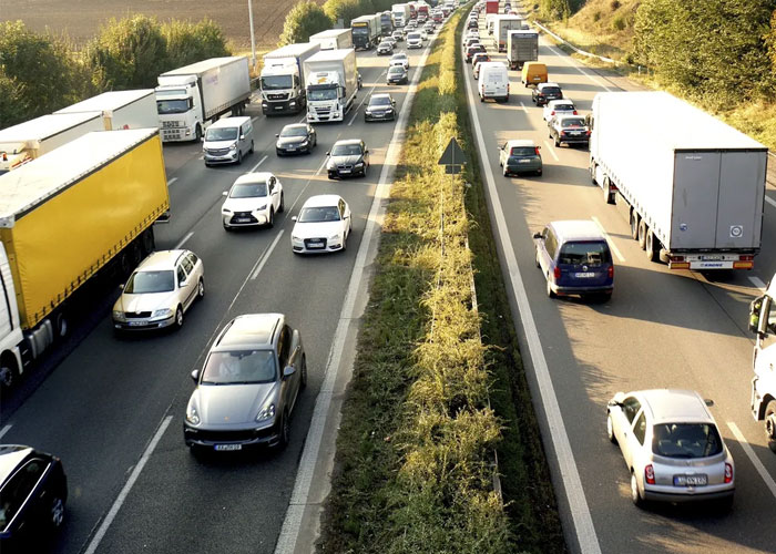 Truck Driver Maliciously Complies To Letting A Karen Illegally Pass Him In Traffic, She Immediately Crashes Into A Cop Car
