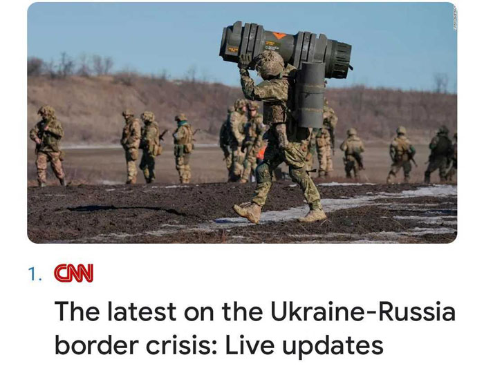 What Is The Large, Cylindrical Military Device That The Soldier Is Carrying?