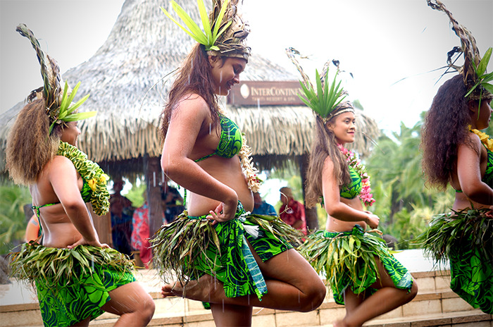 Native tribe woman dancing with clothes from leaves 