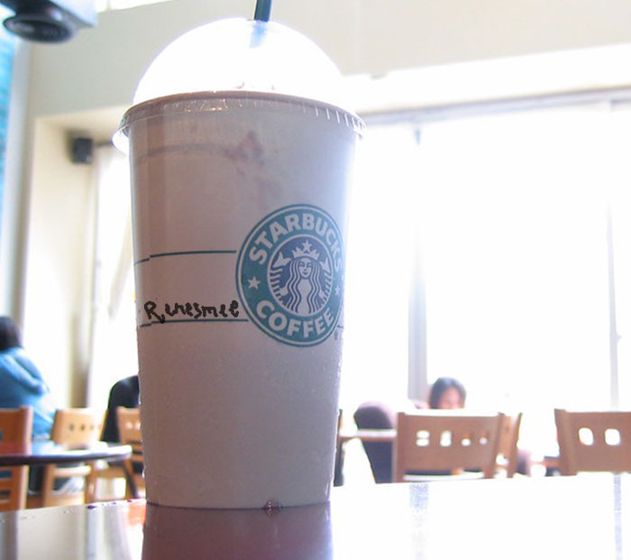 Starbucks cup on a table 
