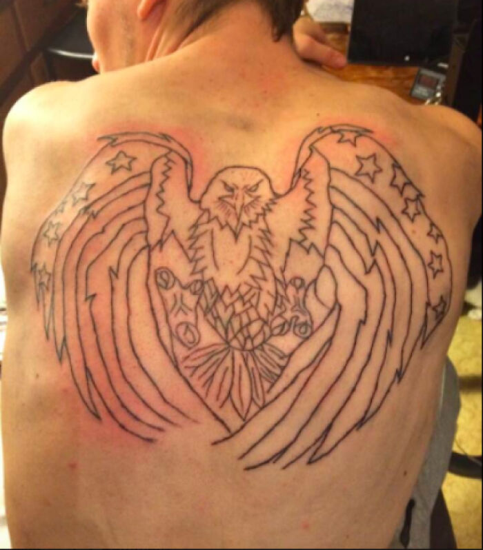 Back tattoo with an eagle and stars, representing one of the worst tattoos from an online group.