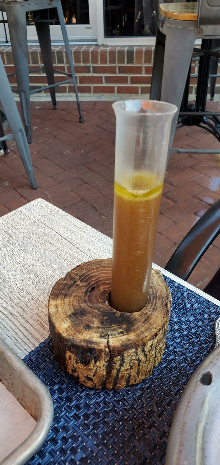 Soup In A Test Tube In A Block Of Wood