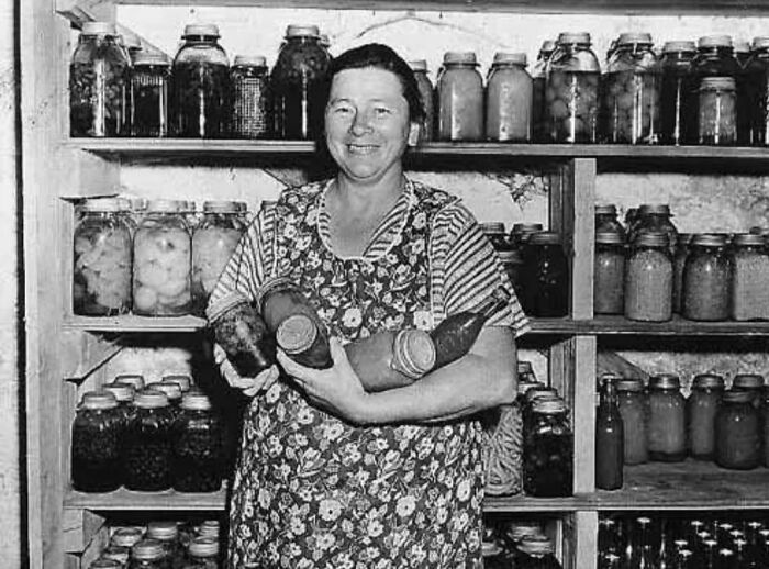 In The Cold, Late Winter Months When It Seems Like Spring Will Never Come Again, Nothing Can Feel Better Than Opening A Jar Of Last Summers Produce. All Of The Hard Work Showcased On Rough Board Shelves Deep Back In A Basement Or Cellar. Do You Remember This? Perhaps Your Mother, Or Grandmother Working All Summer Long To Insure Well Stocked Shelves For The Winter. The Certain Feel Of The Cool Air As You Went Down To Fetch A Certain Jar. Peaches, Green Beans, Tomatoes And Many Others. What Memories Does This Picture Bring Back For You?