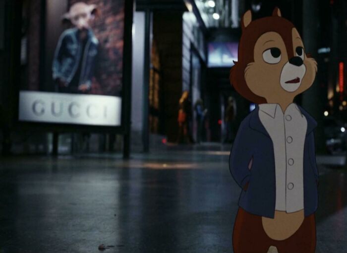 Animated character standing on a city street at night, highlighting Easter eggs and hidden details from popular films.