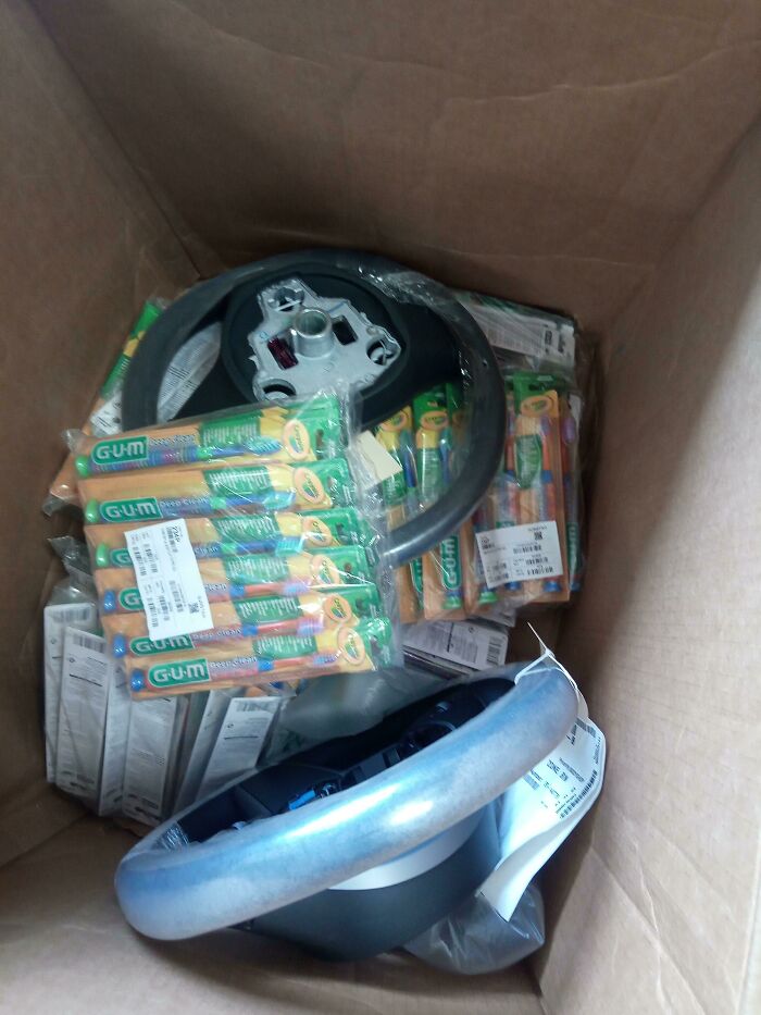 We Ordered 1 Tesla Model 3 Steering Wheel. They Sent 2 And Packed Them With 144 Children's Toothbrushes. 12 Packs Of 12. Wtf