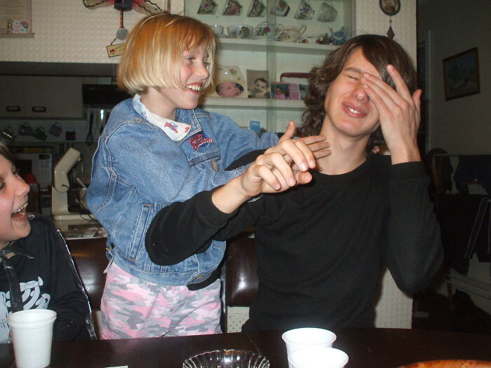 I Think She Was Supposed To Be Giving Him A Kiss Because She Touched The Bottom When Cutting Her Birthday Cake