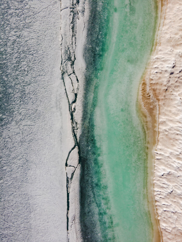 The Shore Of An Alpine Lake Beginning To Melt Out