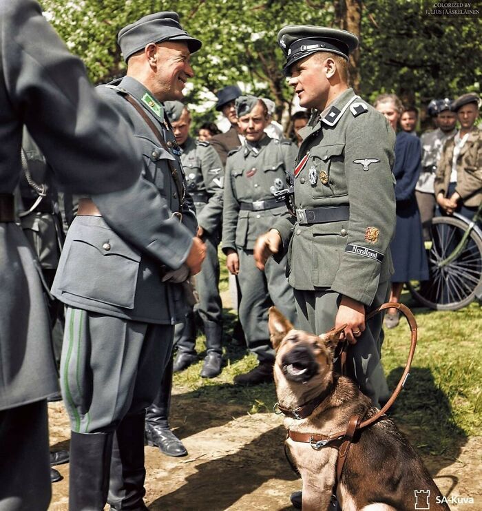 A Finnish Major Talking To A Blind Finnish Volunteer Who Has Just Returned. Taken In Hanko, Finland, On 1 June 1943
