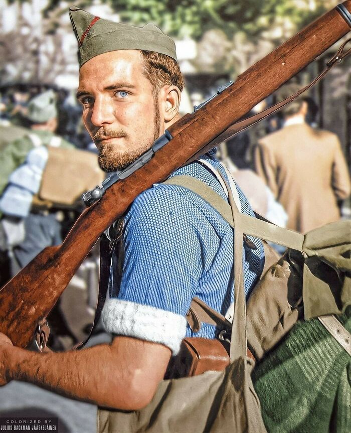 A Republican Militiaman Photographed Looking Into The Camera While He And Many Others Leave Barcelona To The Front. Photograph In Barcelona In Late July 1936 At The Beginning Of The Spanish Civil War