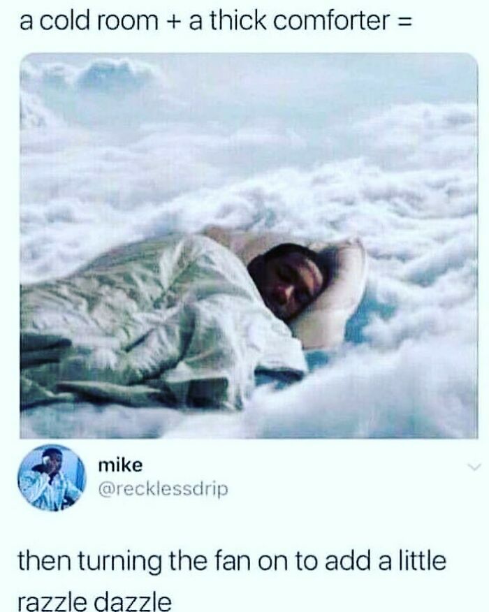 Man sleeping under a thick comforter in a cloud-like setting, relatable meme from Introvert Nation Instagram page.