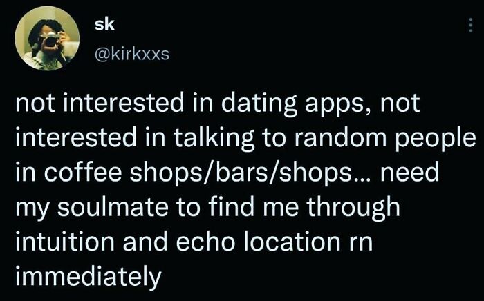 Tweet about introverts avoiding dating apps and random social interactions, seeking soulmate through intuition, reflecting introvert nation humor.