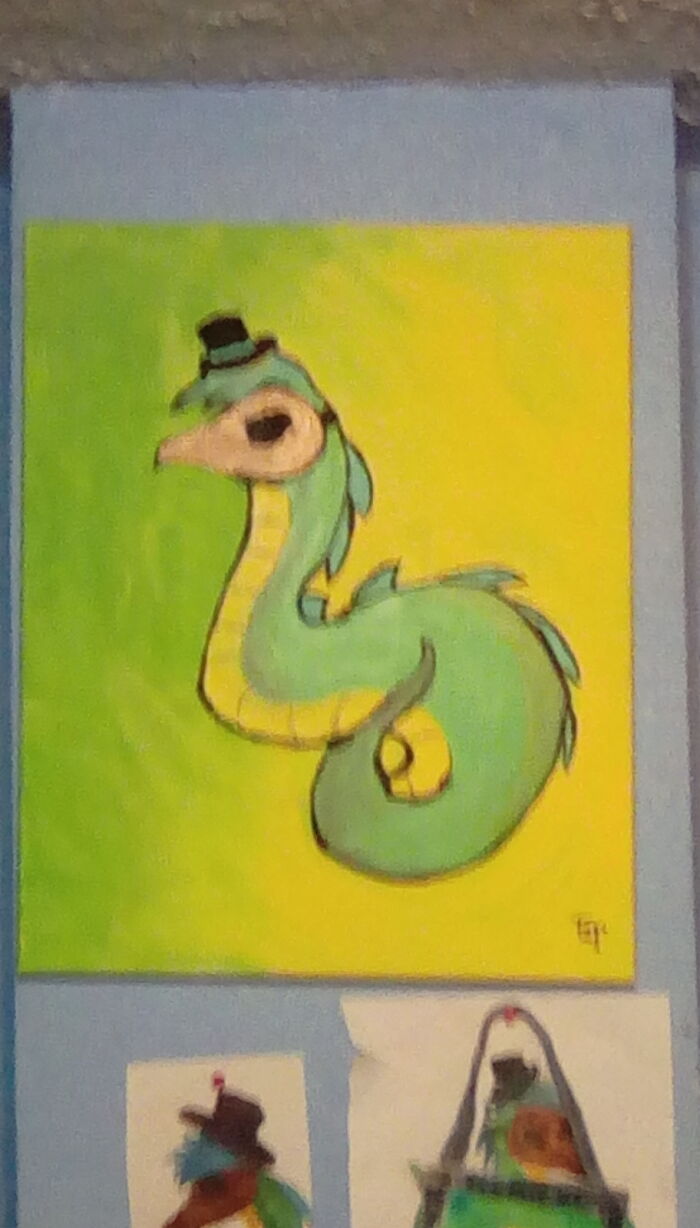 My Wall Of Paintings And Drawings Of My Mascot, “Doctor Corona” (There's Way More Pictures Than This, But It's The Only Image I Had Saved At The Time)