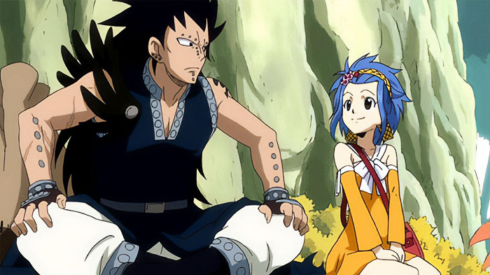 Anime couple sitting together outdoors, showcasing a tender moment.
