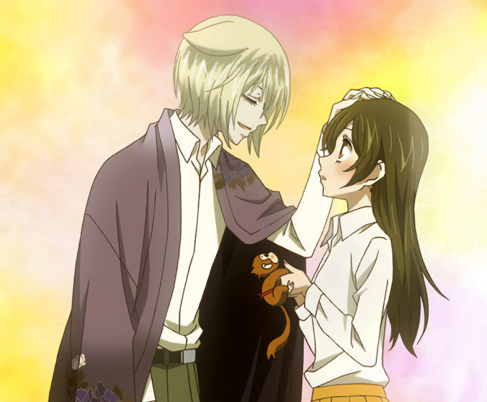 Two cute anime characters with warm expressions sharing a tender moment, highlighting cute anime couples' charm.