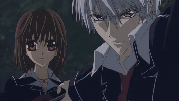 Anime couple in school uniforms with intense expressions in a forest setting; one of the 100 cutest anime couples.