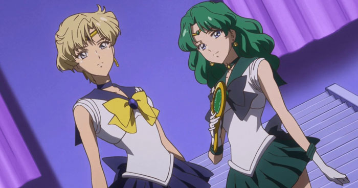 Two anime characters pose in matching outfits; an example of one of the cutest anime couples.