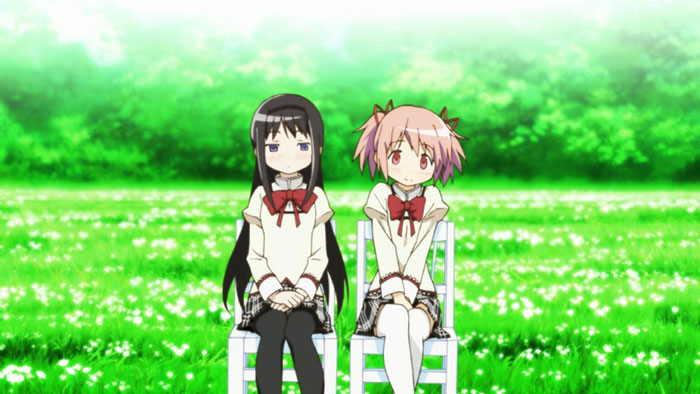 Two cute anime characters sitting on chairs in a meadow, representing adorable anime couples.