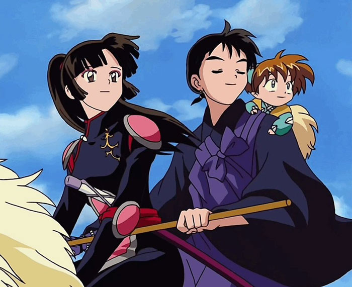 Anime couple with a child, dressed in traditional outfits, riding on a fluffy creature.