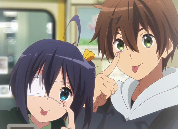 Anime couple making playful faces, one with an eyepatch.