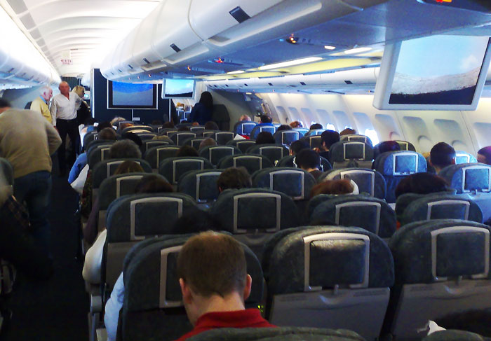 Guy Maliciously Complies After Company Demands He Take Economy-Class Plane Instead Of 1st-Class Train