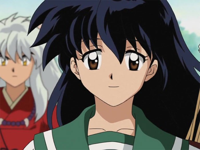 Female anime character with black hair and green attire, accompanied by a white-haired character in a red outfit.