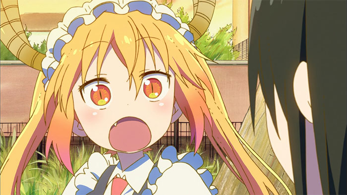 Female anime character with dragon features and colorful hair talking to another character outdoors.