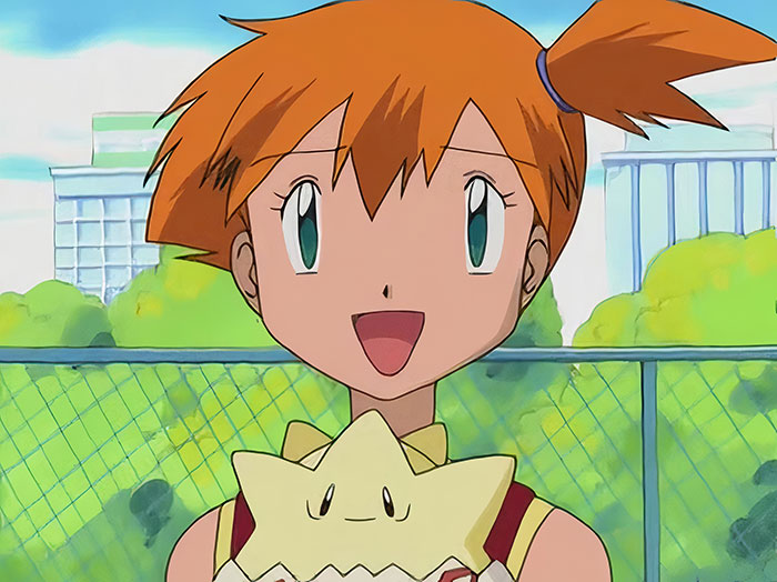 Red-haired female anime character with star-shaped creature, outdoors scene. Popular anime character among fans.