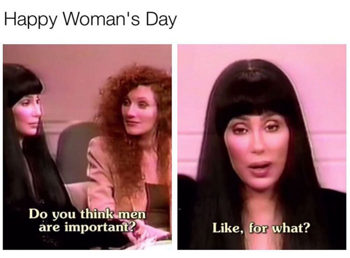Two women in a retro TV setting exchange witty remarks about the importance of men.