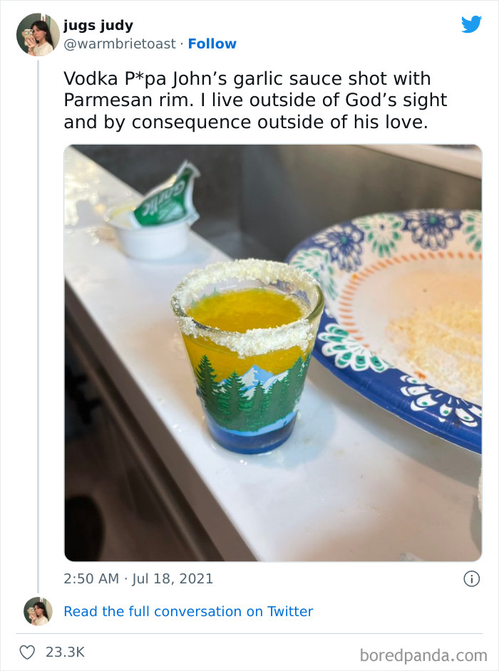 Shot glass with yellow garlic sauce and Parmesan rim, an unusual example of food with threatening auras posted online.