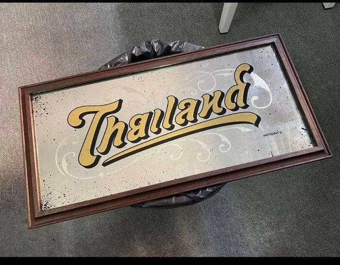 Because Of The Way The Font Was Designed, This Sign Can Be Read Both In Latin Alphabet And Thai Script (ไทยแลนด์). Credit: Monta Paowattanasuk