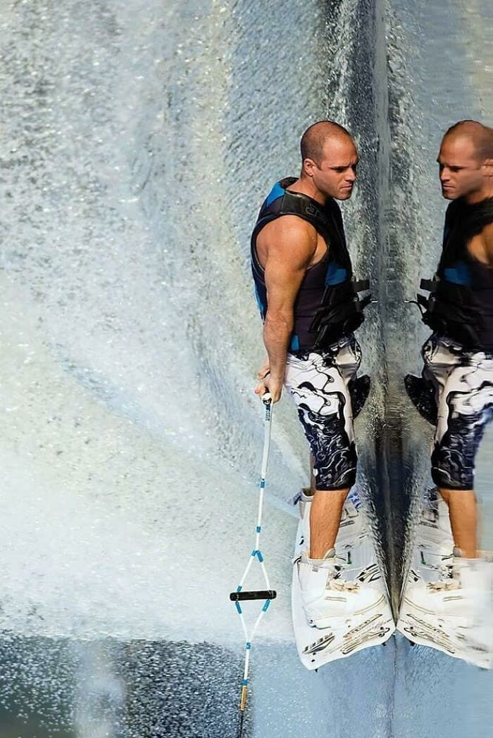 Highrise Window Washer Using New Footsqueegee™ Technology