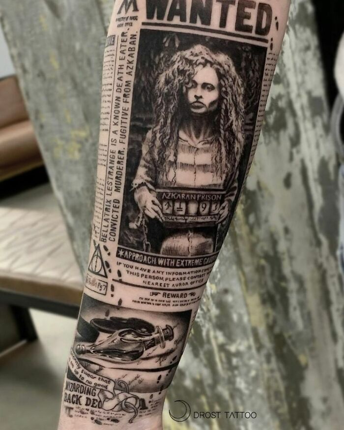 Unique tattoo of a 'wanted' poster on an arm, showcasing creative ink art.