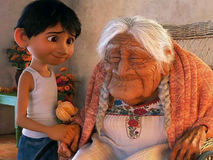 Mama Coco sitting on the chair 