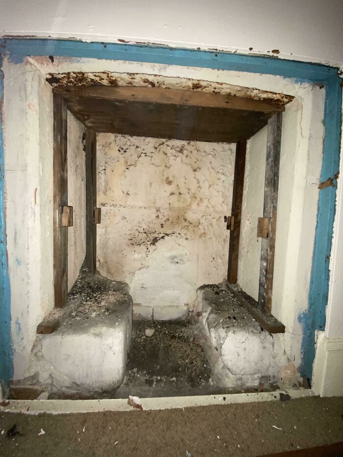 We Knocked Down A Wall In Our House And Found An Old Fireplace. It Still Has Ashes In It