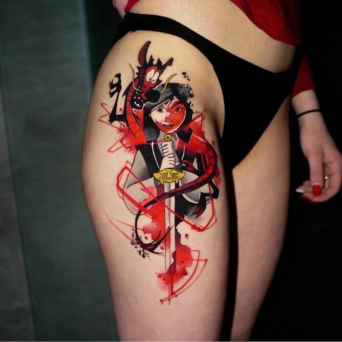 Unique tattoo design featuring a cartoon character in red and black ink on a person's thigh.