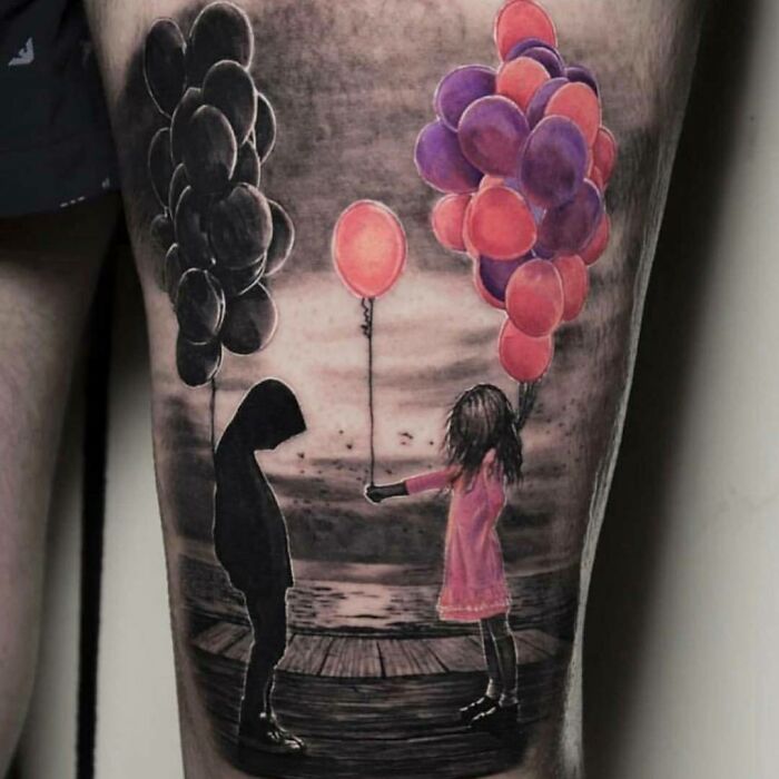 Crazy tattoo of a silhouetted figure and a girl with vibrant balloons on a forearm.