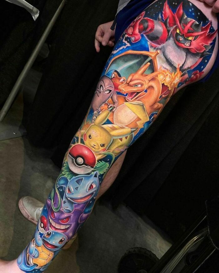 Leg sleeve with colorful tattoos featuring popular fictional characters.