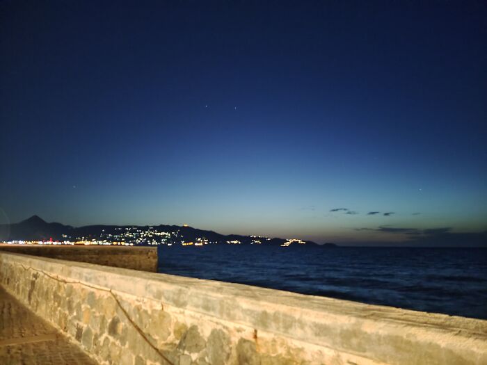 Lights Turning On And The First Stars Coming Out. Heraklion, Greece