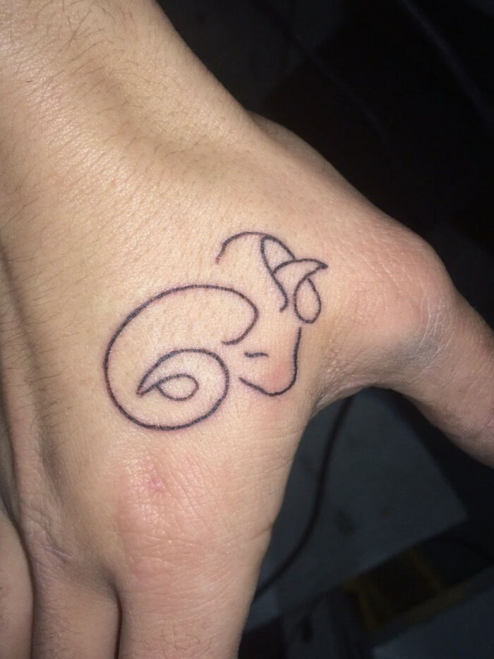 Simple tattoo on a hand that some people consider a red flag design.