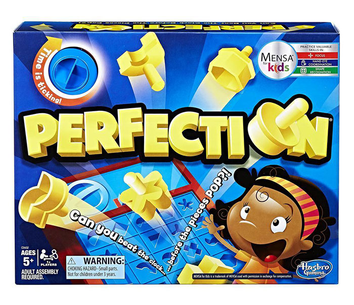 Perfection board game box showing yellow shapes and a child playing, a fun board game for kids entertainment.