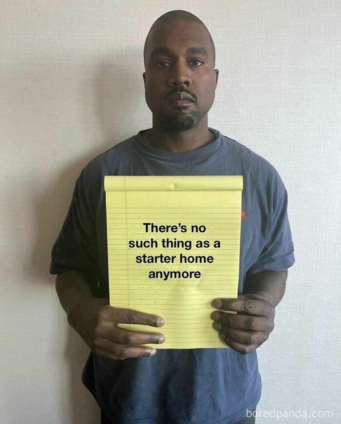 A person holding a notepad with the text "There's no such thing as a starter home anymore," reflecting homeownership memes.