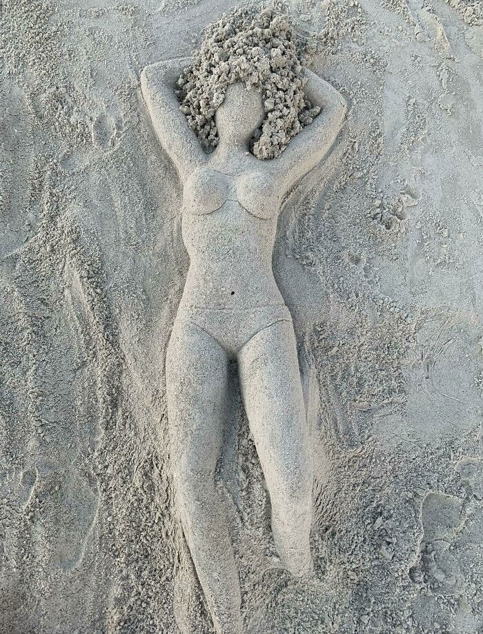 Sand Sculpture Of A Girl That I Found On The Beach